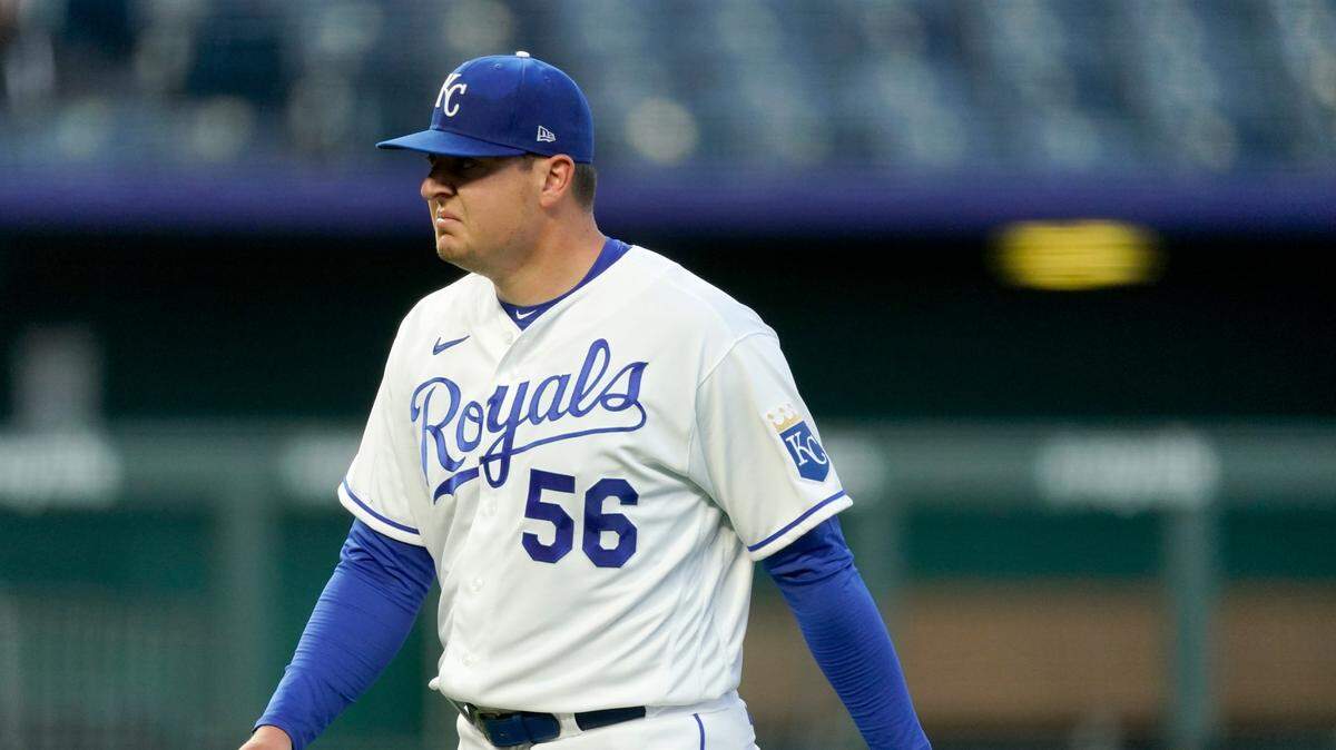 Kansas City Royals starting pitcher Brad Keller walks to the dugout after coming out of the game during the second inning against the Tampa Bay Rays on Tuesday, April 20, 2021, at Kauffman Stadium in Kansas City, Mo.
