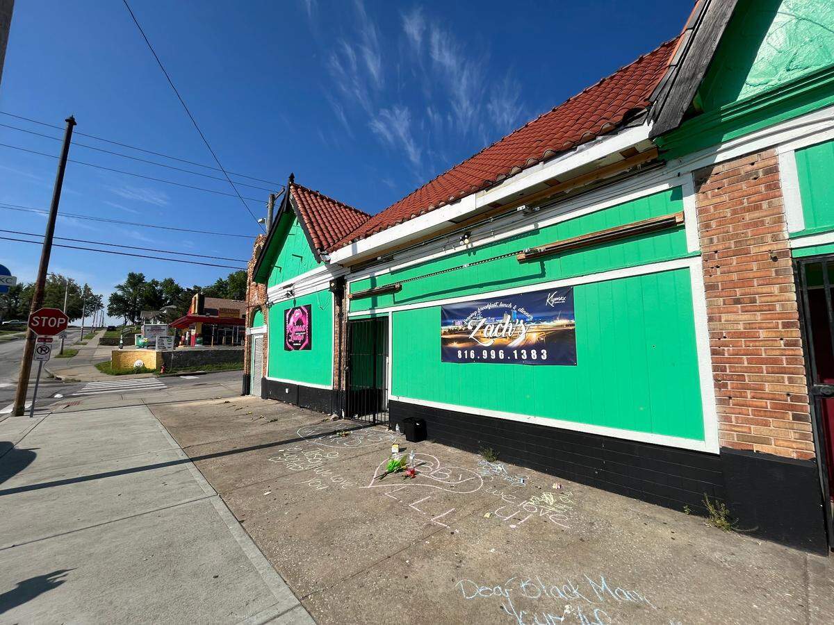 Messages were written in chalk on the sidewalk outside Klymax Lounge, 4242 Indiana Ave., Kansas City, on Sunday morning. Five people were shot at the nightclub the night before.