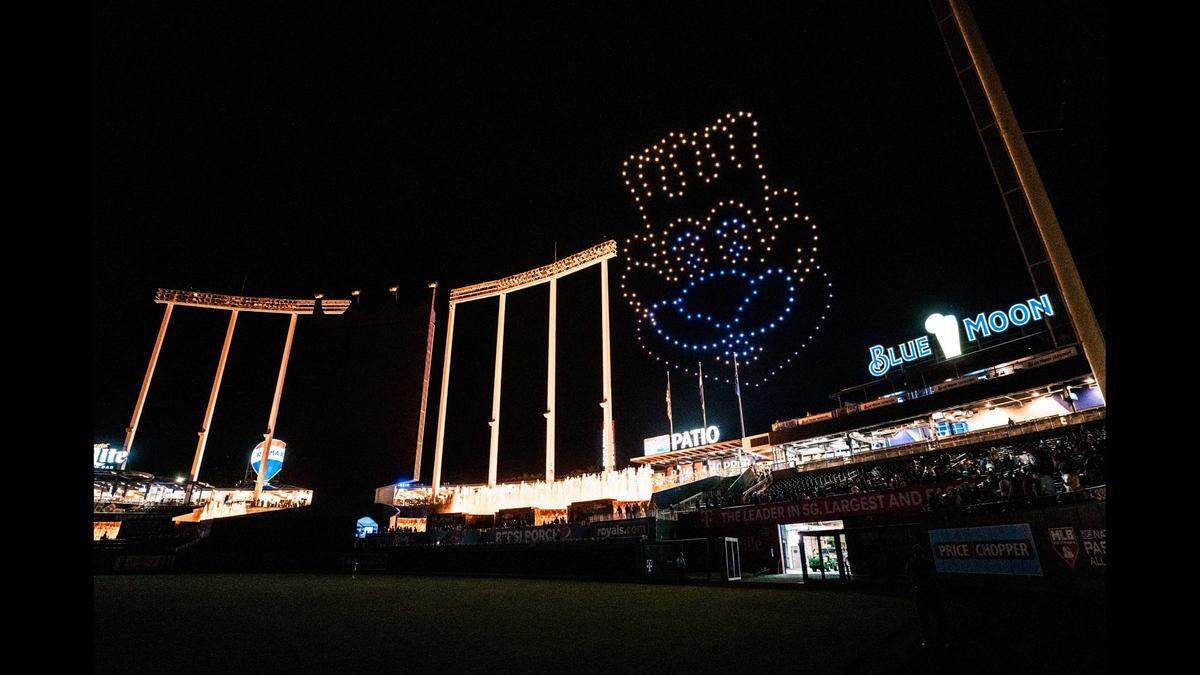 Created by over 300 drones, an image of Kansas City Royals mascot Sluggerrr looms over Kauffman Stadium after a game in 2023.