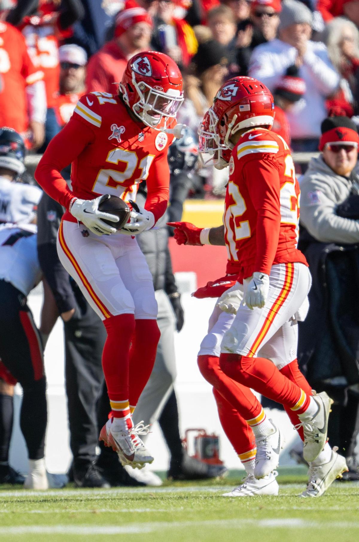 Kansas City Chiefs safety Jaden Hicks (21) celebrates an interception in the first half against the Houston Texans at GEHA Field at Arrowhead Stadium on Saturday, Dec. 21, 2024.