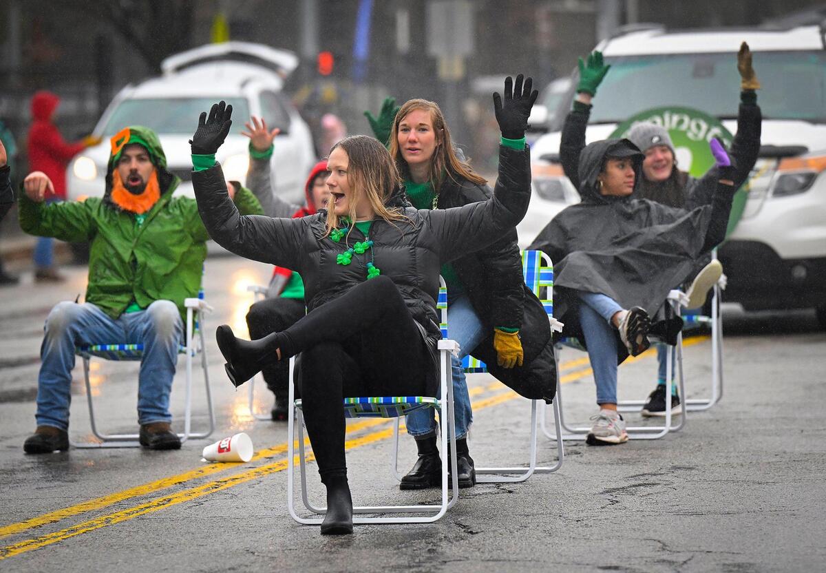 Members of the Flemington Clan performed their lawn chair routine during the 2023 Brookside St. Patrick’s Day Warm-Up Parade on Saturday March 11, 2023 in Kansas City.