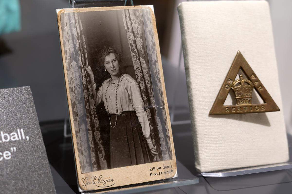 A photograph of Emma Addams, a munitionette who played and watched football, is displayed in the new exhibition “The Beautiful Game,” highlighting the role of soccer during World War I, at the National WWI Museum and Memorial on Wednesday, April 1, 2026, in Kansas City.