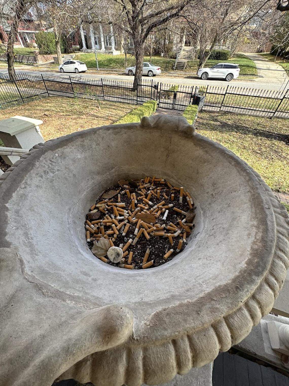 Cigarette butts in the front porch planter of the Kansas City house that Rebecca King of Overland Park and her family rented for a $5,000 week-long stay at Thanksgiving.