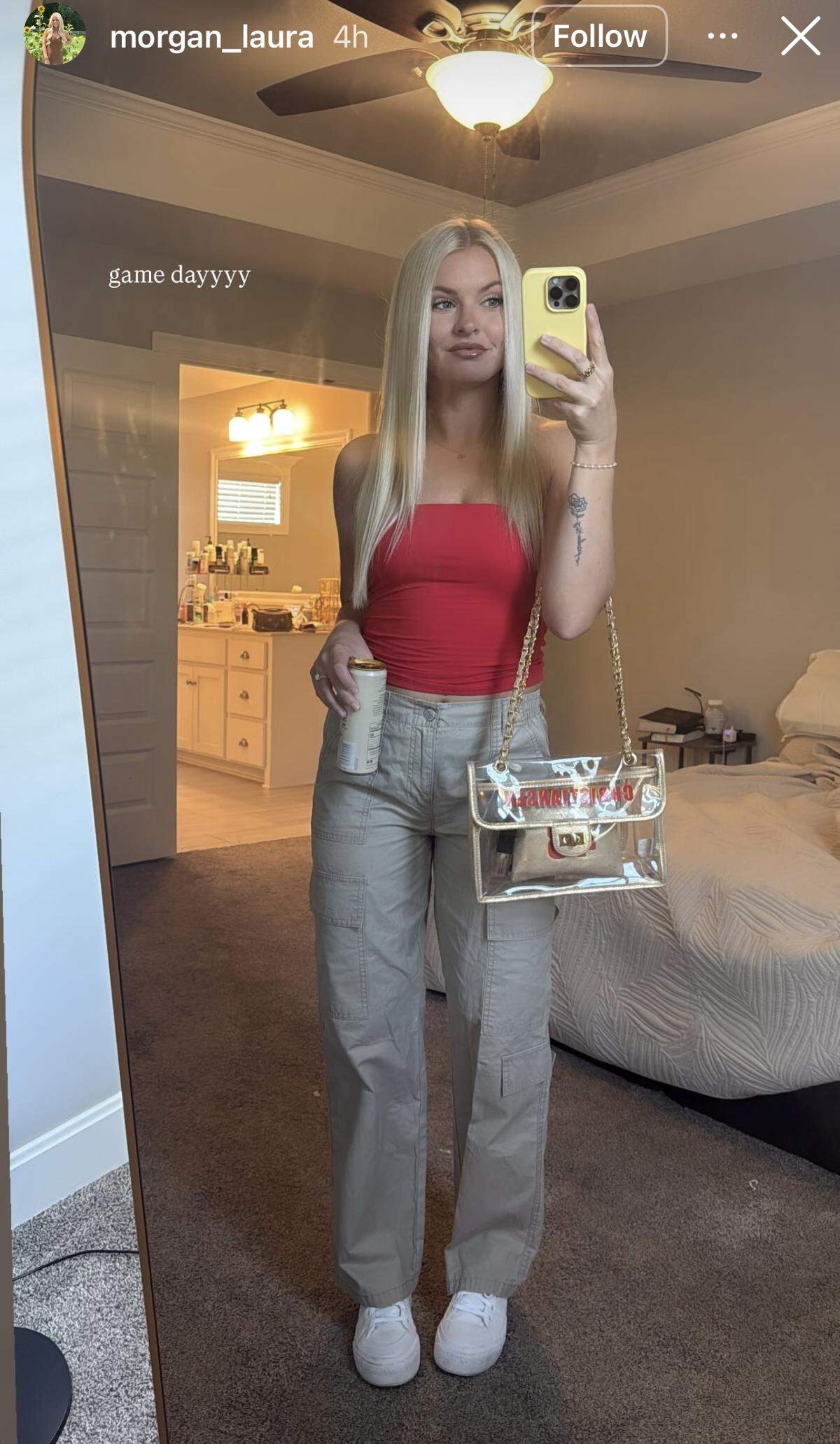 Morgan Christiansen’s game-day fit includes the clear-plastic bags the Chiefs gave the team’s WAGs.