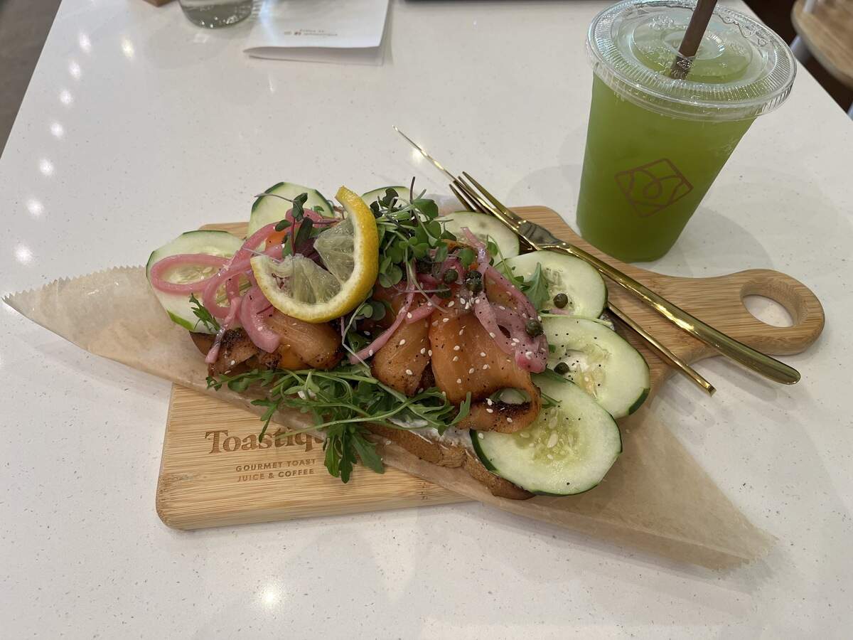 The Smoked Salmon (herbed cream cheese, arugula, cucumber, smoked pastrami salmon pickled onion, capers, toasty seasoning, microgreens and lemon twist; $16). It is typically served on sourdough toast, but I got the gluten free bread for $2 more.