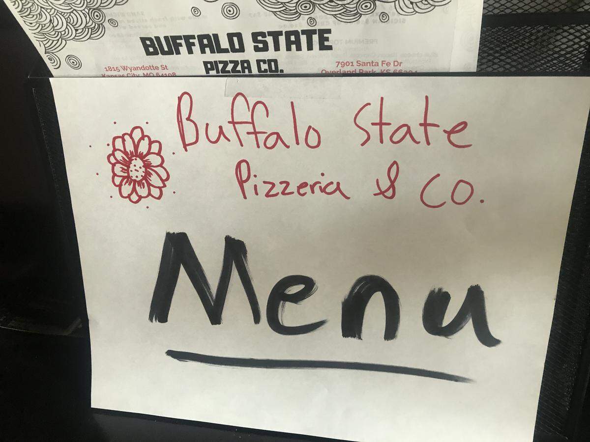 A sign inside 1815 Wyandotte — formerly Papa Keno’s Pizzeria — directed customers to the Buffalo State’s menu.