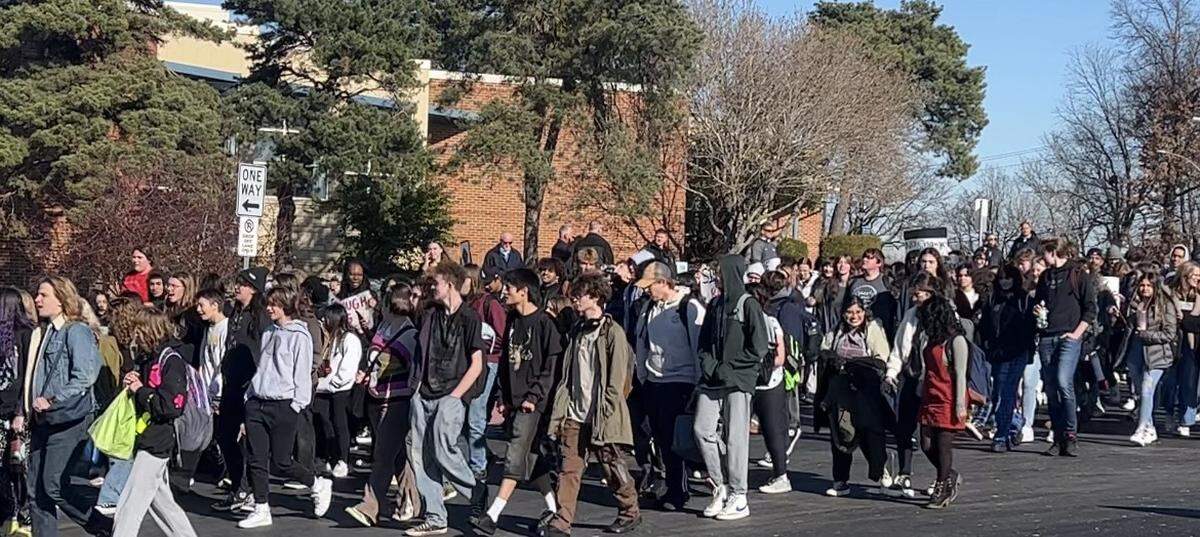 Dozens of Shawnee Mission East High School students walked out of class and marched outside in protest of the school’s handling of racist incidents.