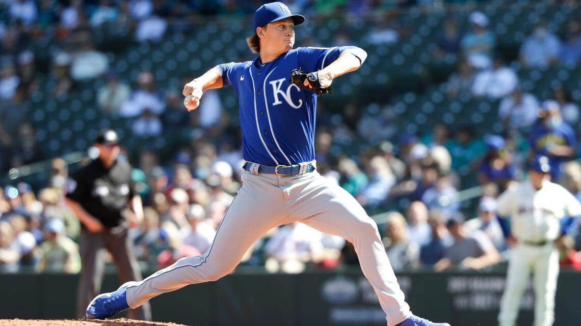 Kansas City Royals starting pitcher Brady Singer throws to a Seattle Mariners batter during the second inning of a baseball game Sunday, Aug. 29, 2021, in Seattle. (AP Photo/Jason Redmond)