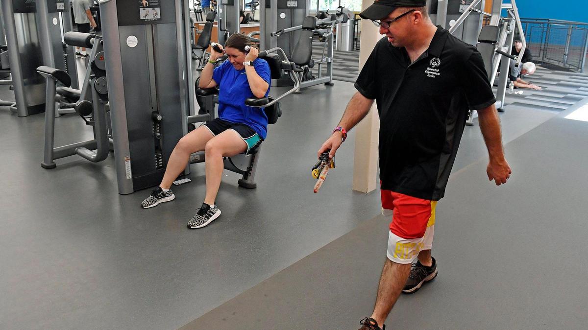 Ali Brown, left, and Patrick Brown trained recently at a local gym to prepare for the Special Olympics USA. Last week, their dreams became a reality as Patrick won the 200-meter dash and Ali also won gold at the 4x100 swim relay at the national competition in Orlando. The married couple, who both have Asperger’s Syndrome, trained five days a week — often alone because of the pandemic. Pushing through doubt, Patrick and Ali said they relied on each other to get through the hard work.