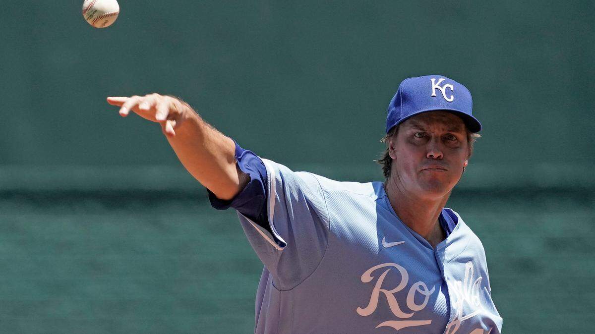 Kansas City Royals starting pitcher Zack Greinke throws during the first inning of a baseball game against the Cleveland Guardians Sunday, July 10, 2022, in Kansas City, Mo. (AP Photo/Charlie Riedel)