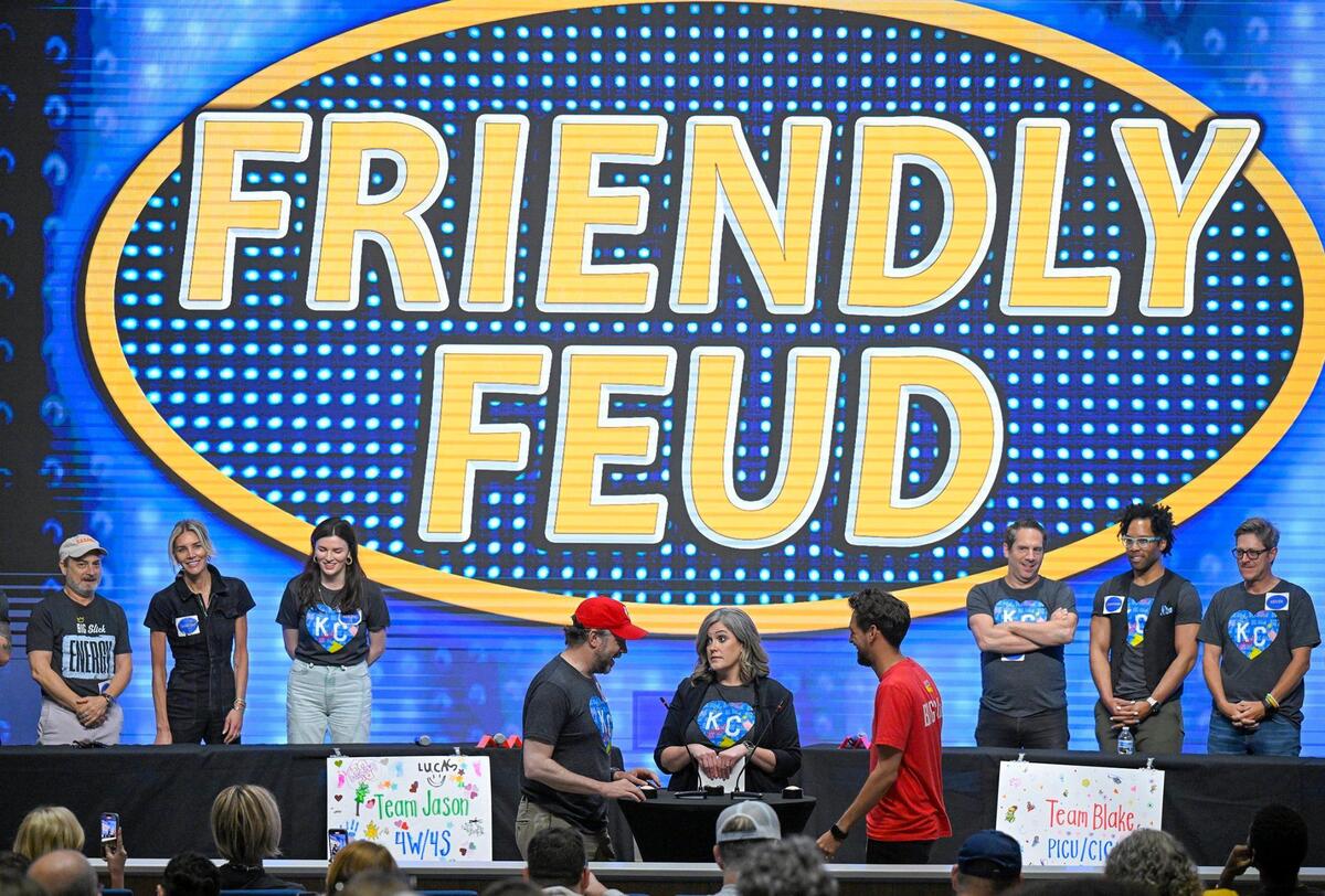 Big Slick Celebrity Weekend host Jason Sudeikis, in the red hat, competed against magician Blake Vogt during a game of Friendly Feud at Children’s Mercy Hospital on Friday.