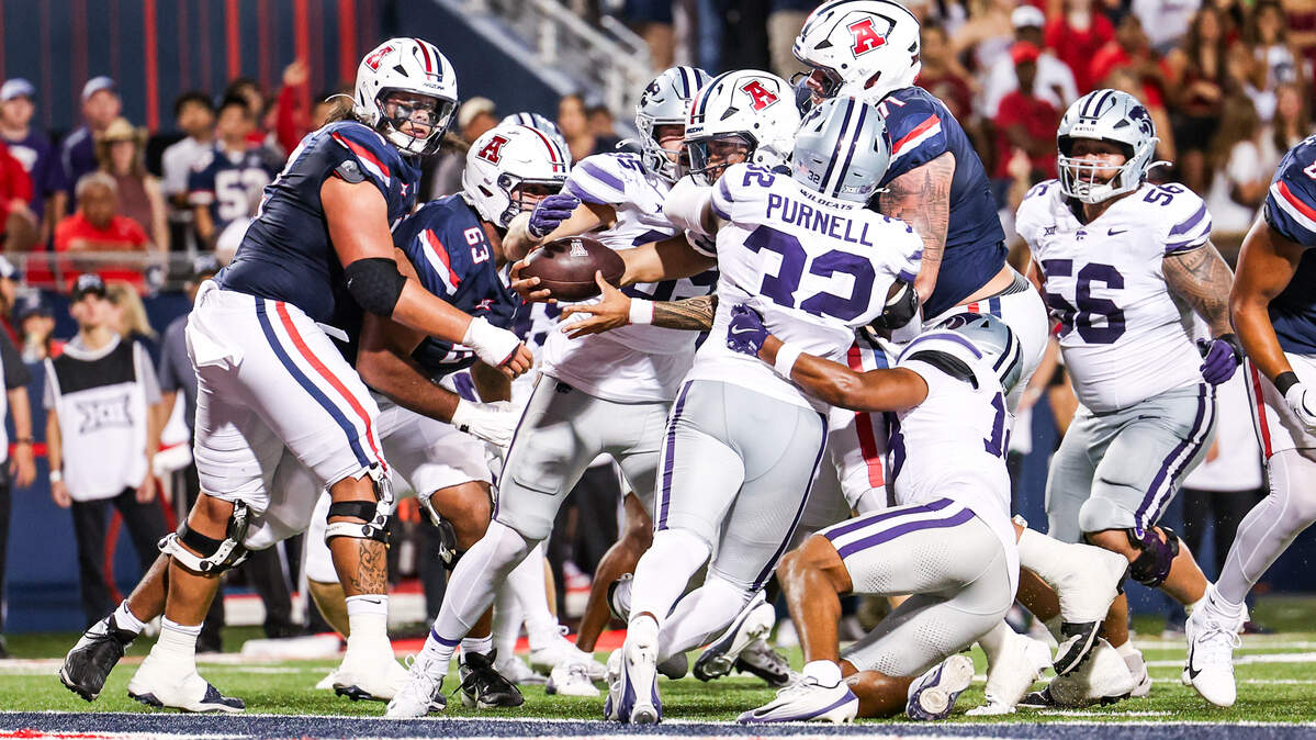 Arizona Wildcats quarterback Noah Fifita reaches the ball across the goal line for a touchdown during a college football game against the Kansas State Wildcats at Arizona Stadium in Tucson, Arizona on Friday, Sept. 12, 2025.