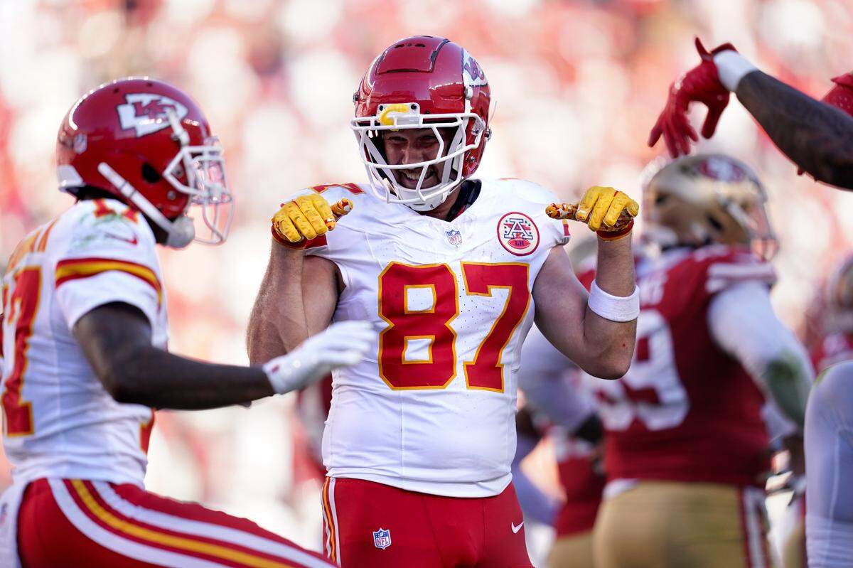 Tight end Travis Kelce, No. 87, celebrates a Chiefs touchdown against the San Francisco 49ers with teammate Mecole Hardman on Sunday at Levi’s Stadium in Santa Clara, Calif.