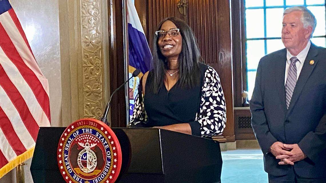 Robin Ransom, a Missouri court of appeals judge, speaks to reporters about her appointment by Gov. Mike Parson, right, to the Missouri Supreme Court. She will be the first Black woman to serve on state’s the highest court.