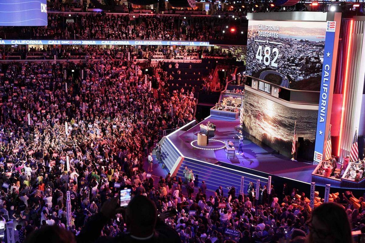 California delegates cast their votes during a ceremonial roll call on the second day of the 2024 Democratic National Convention in Chicago. Aug. 20, 2024