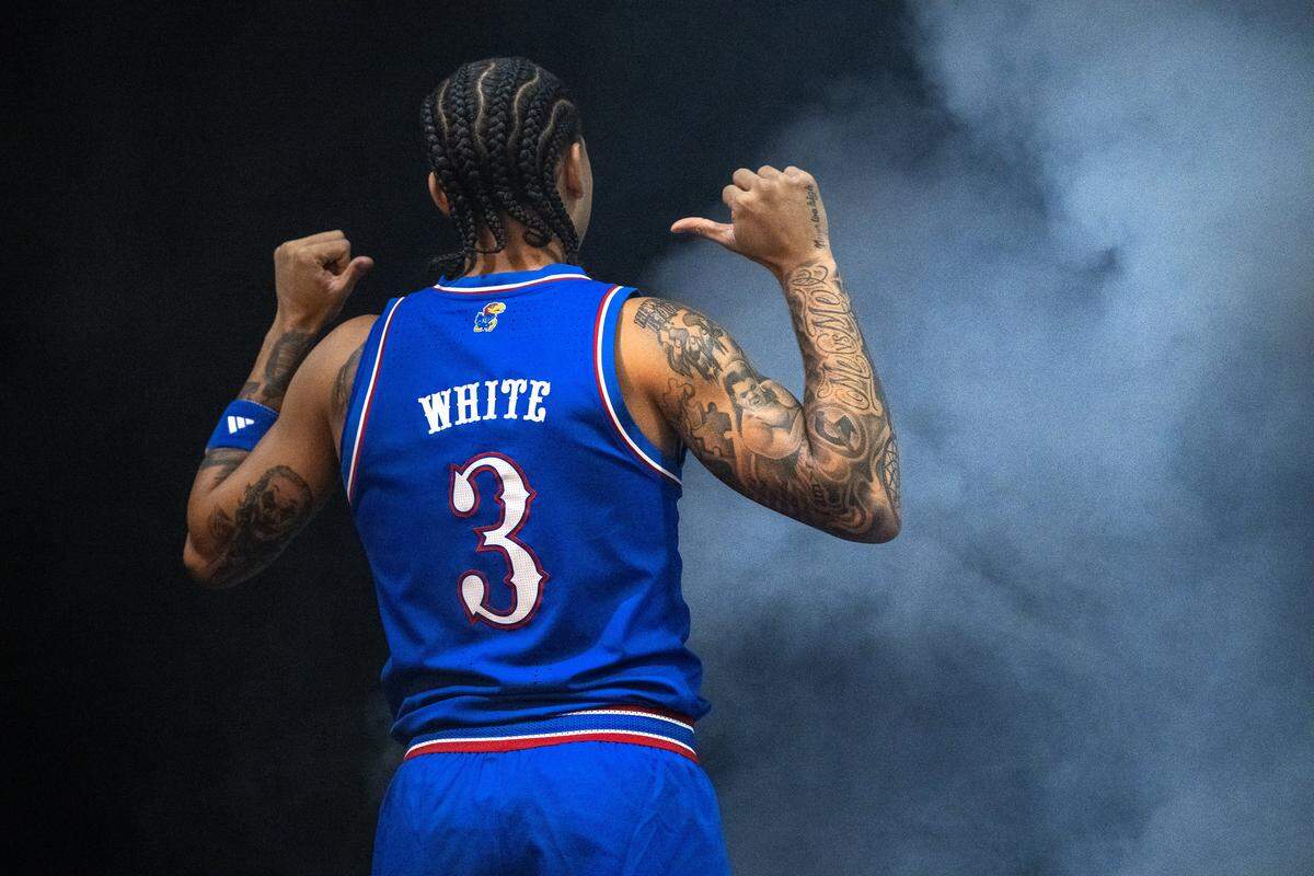 Kansas guard Tre White has his photo taken during Big 12 Basketball Media Day at T-Mobile Center on Wednesday, October 22, 2025, in Kansas City.