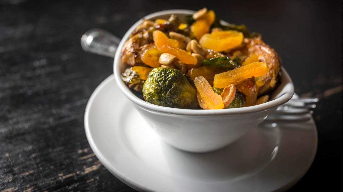 The Brussels sprouts at Merchants Pub & Plate, which has been sold to Kansas City’s W. VinZant Restaurants.