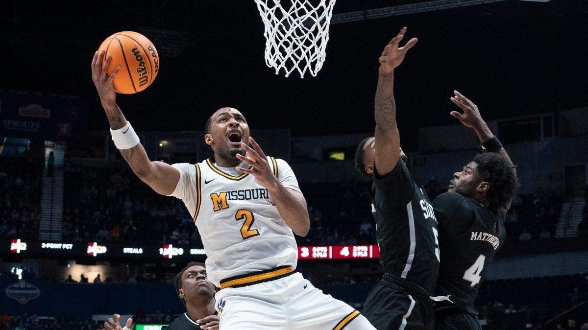 Missouri Tigers guard Tamar Bates (2) takes a shot against Mississippi State Bulldogs guard Shawn Jones Jr. (5) during their second round game at the SEC Men’s Basketball Tournament at Bridgestone Arena in Nashville, Tenn., Thursday, March 13, 2025.