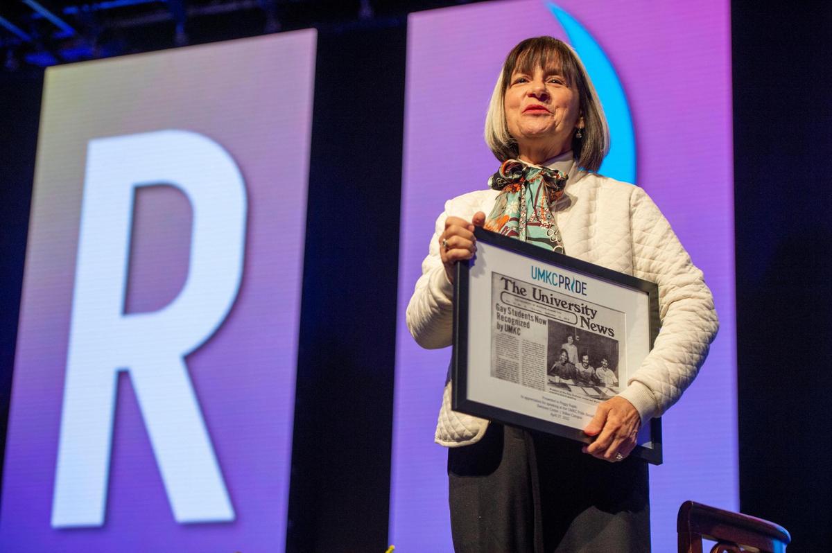 Peggy Rajski, a founder of the Trevor Project, accepts a gift of appreciation for speaking at the UMKC Pride Breakfast on Wednesday, April 27, 2022, at the Swinney Recreation Center. The Trevor Project provides crisis intervention and suicide prevention services to LGBTQ youth.