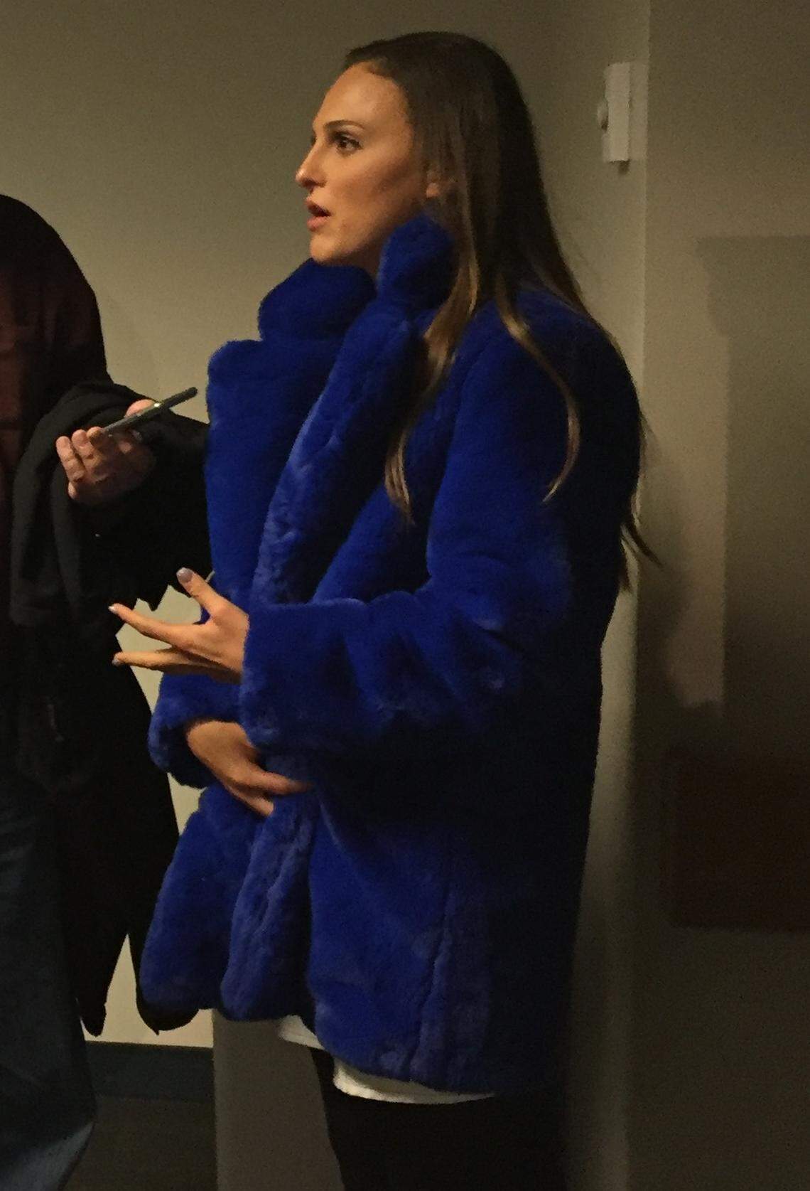 Smacker Miles talks to reporters after her dad, Les, was introduced as KU’s football coach on Nov. 18, 2018 in Lawrence, Kansas.