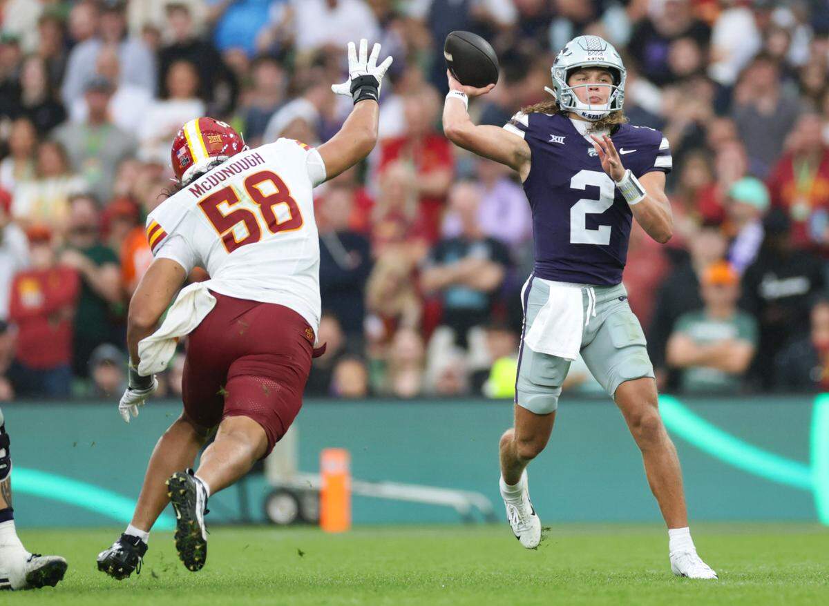 Kansas State quarterback Avery Johnson throws a pass during the Aer Lingus Classic between Iowa State and Kansas State at Aviva Stadium in Dublin, Ireland, on Aug. 23, 2025.