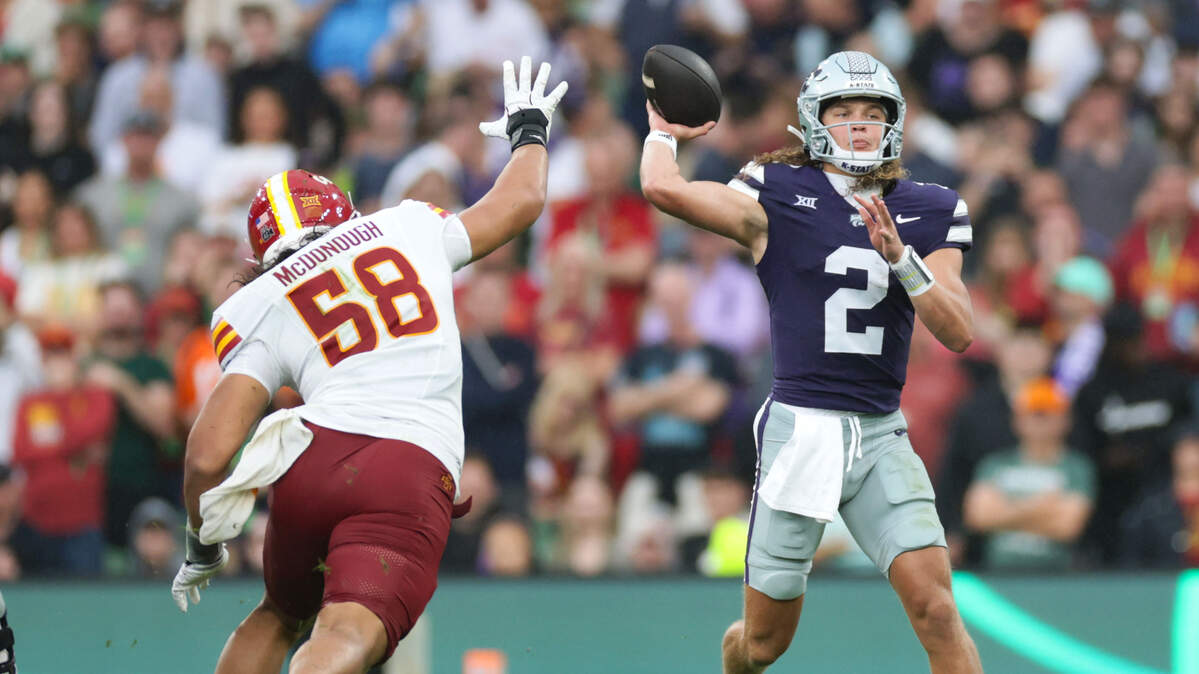 Kansas State quarterback Avery Johnson throws a pass during the Aer Lingus Classic between Iowa State and Kansas State at Aviva Stadium in Dublin, Ireland, on Aug. 23, 2025.