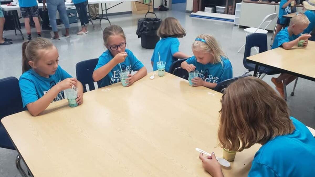 Children attending Summit Christian Academy’s summer camp made “edible aquifers” earlier this month consisting of ice cream, gummy bears, sprinkles and food coloring. Representatives of the Missouri Department of Natural Resources went to Camp Eagle to demonstrate what happens to an aquifer when bad things like oil are poured on the ground. After the research, of course, the kids couldn’t let all that ice cream go to waste.