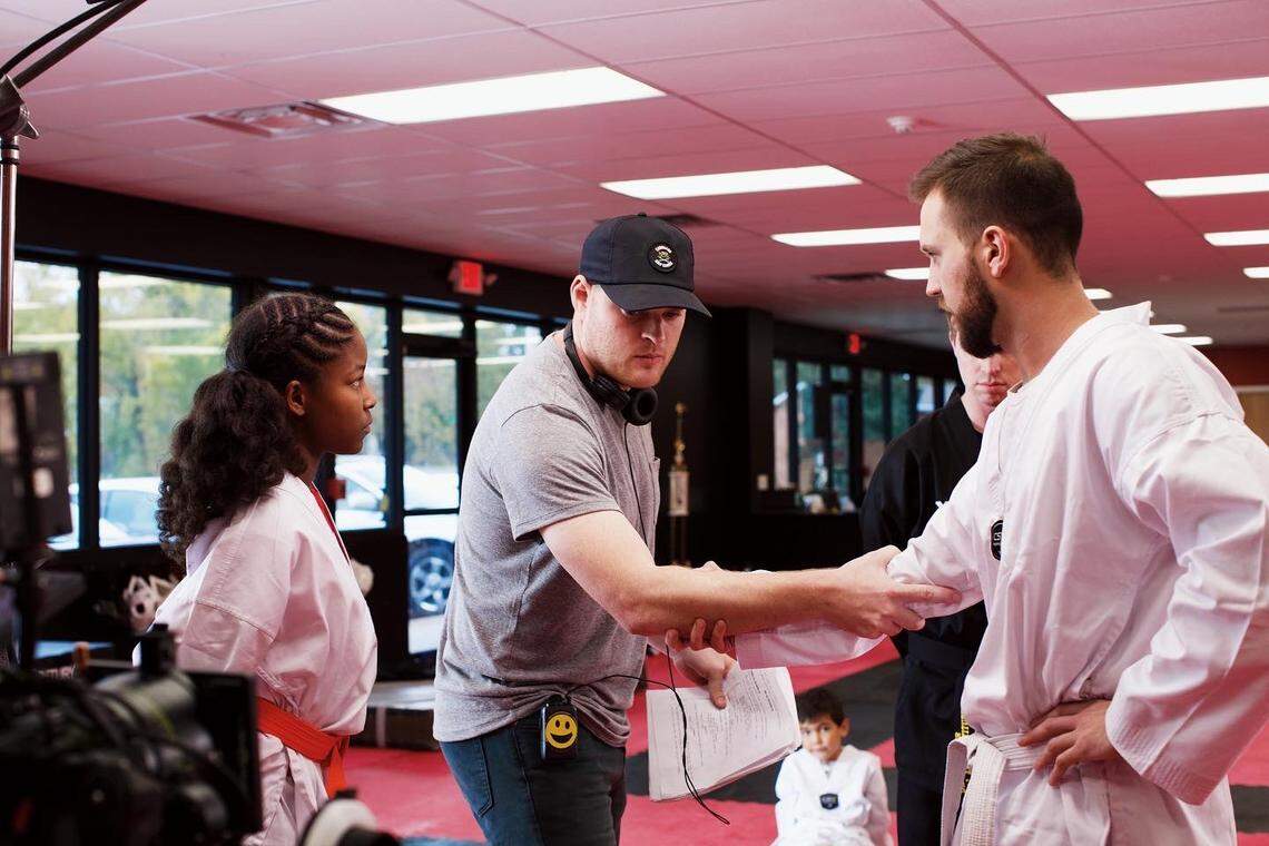 Behind the scenes from Episode 4 of “Middle School Maddox.” Trey Kennedy, right, partnered with director Sam Findlay to create the web series.