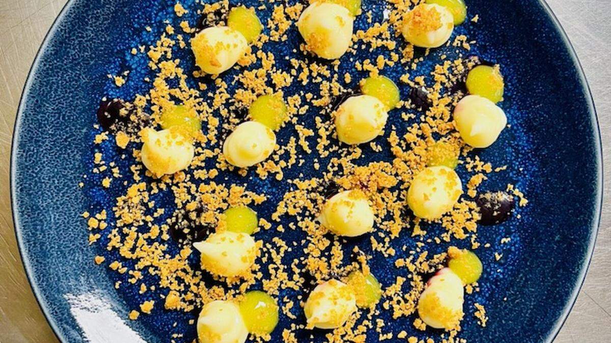 The Peacock’s liquid cheesecake (coconut cheesecake, mango puree and dragon fruit syrup with graham cracker crumbs).