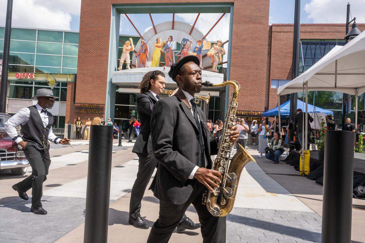 Ernest Melton plays the saxophone at the re-opening of the pedestrian mall in the 18th & Vine Jazz District on Wednesday, May 27, 2026, in Kansas City.