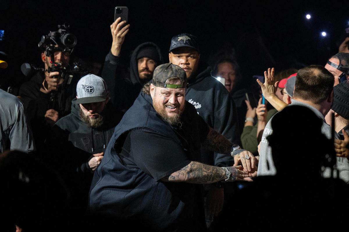 Jelly Roll greets fans as he walks out to perform the song “I Am Not Okay” during the Beautifully Broken Tour at T-Mobile Center on Wednesday, Nov. 13, in Kansas City.