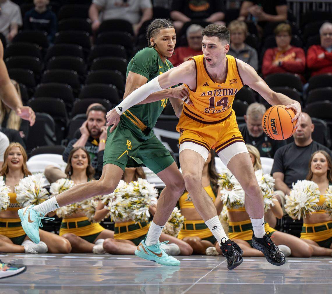 Arizona State Sun Devils forward Andrija Grbovic (14) guards the ball from Baylor Bears guard Cameron Carr (43) during the first half of the Big 12 Men's Basketball Tournament at T-Mobile Center on Tuesday, March 10, 2026, in Kansas City. 
