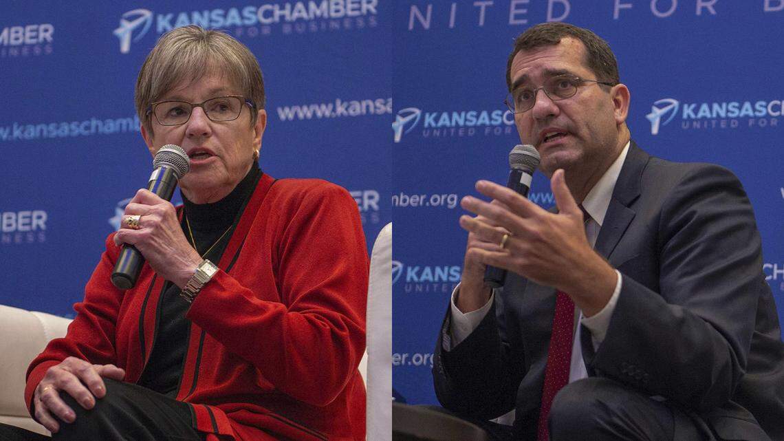 Kansas Gov. Laura Kelly and her Republican opponent for governor Kansas Attorney General Derek Schmidt answer questions from a moderator during a Kansas Chamber of Commerce event at the Embassy Suites by Hilton on Wednesday, Sep. 7, 2022, in Olathe.