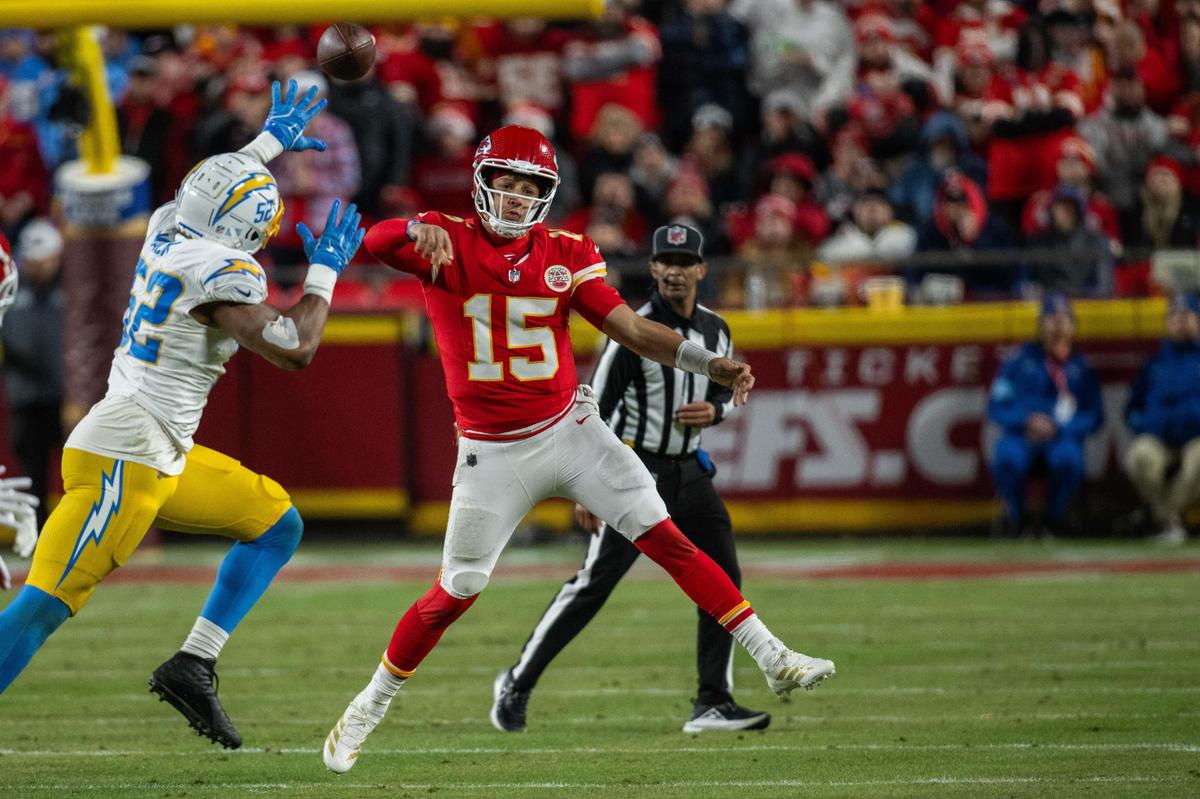 Kansas City Chiefs quarterback Patrick Mahomes scrambles during the first half of the Chiefs game vs. the Los Angeles Chargers on Sunday, Dec. 8, 2024 at GEHA Field at Arrowhead Stadium.