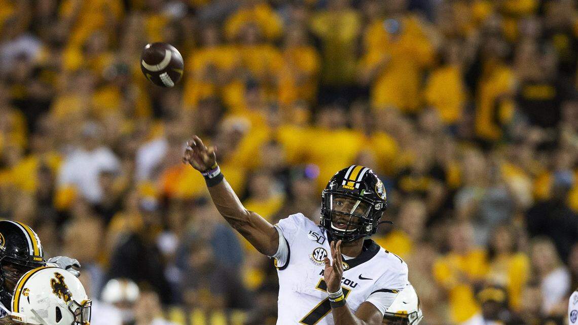 Missouri quarterback Kelly Bryant (7) passes the ball in the fourth quarter against Wyoming during an NCAA college football game Saturday, Aug. 31, 2019, in Laramie, Wyo. (AP Photo/Michael Smith)
