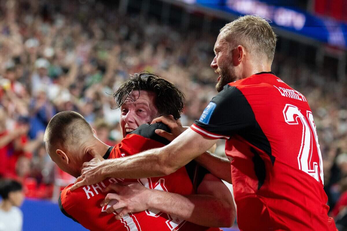 Austrian players celebrate after a last minute goal by Austria in a FIFA World Cup group-stage soccer match at Kansas City (Arrowhead) Stadium in Kansas City on Saturday, June 27, 2026.