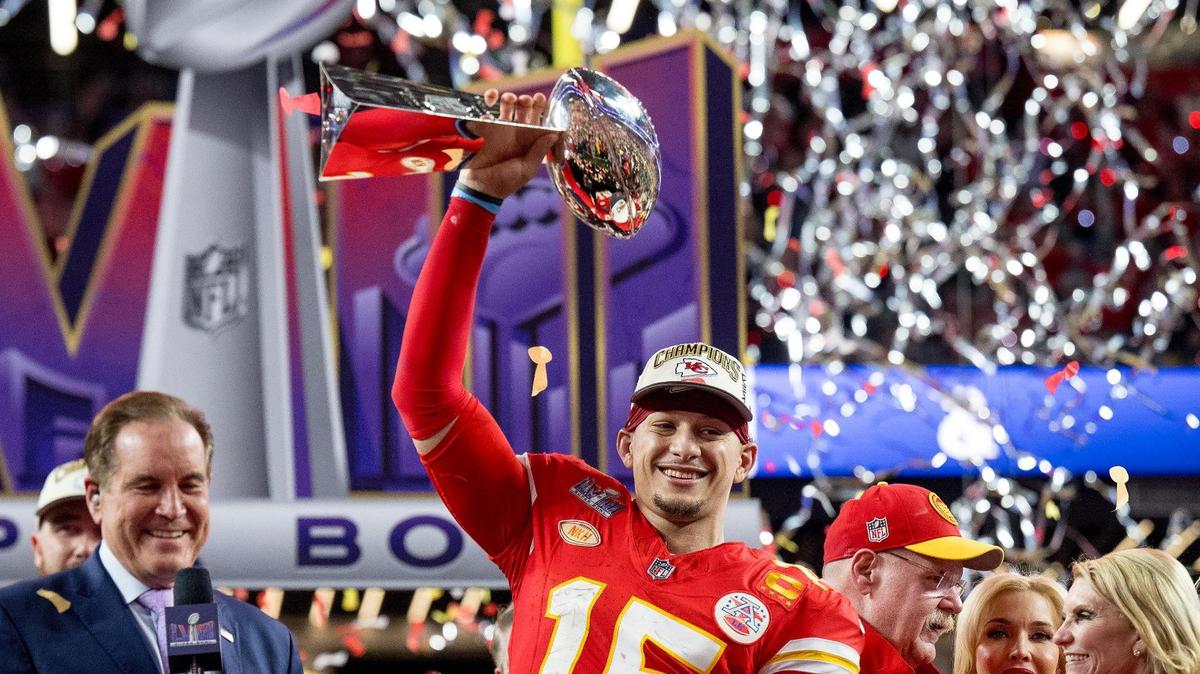 Kansas City Chiefs quarterback Patrick Mahomes (15) hoists the Lombardi Trophy after the Chiefs defeated the San Francisco 49ers in overtime 25-22 in Super Bowl LVIII on Sunday, Feb. 11, 2024, in Las Vegas.