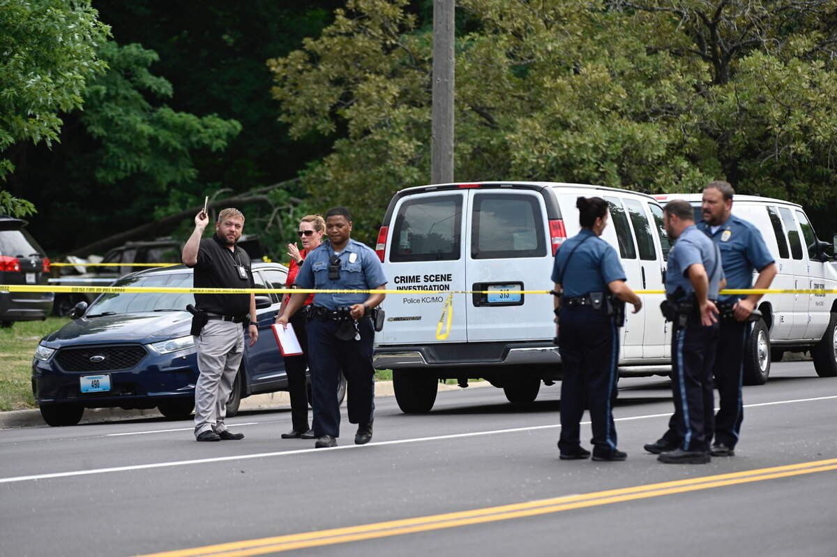 Police investigate a homicide after a man was found in a wrecked car in the 8200 block of Blue Ridge Blvd.