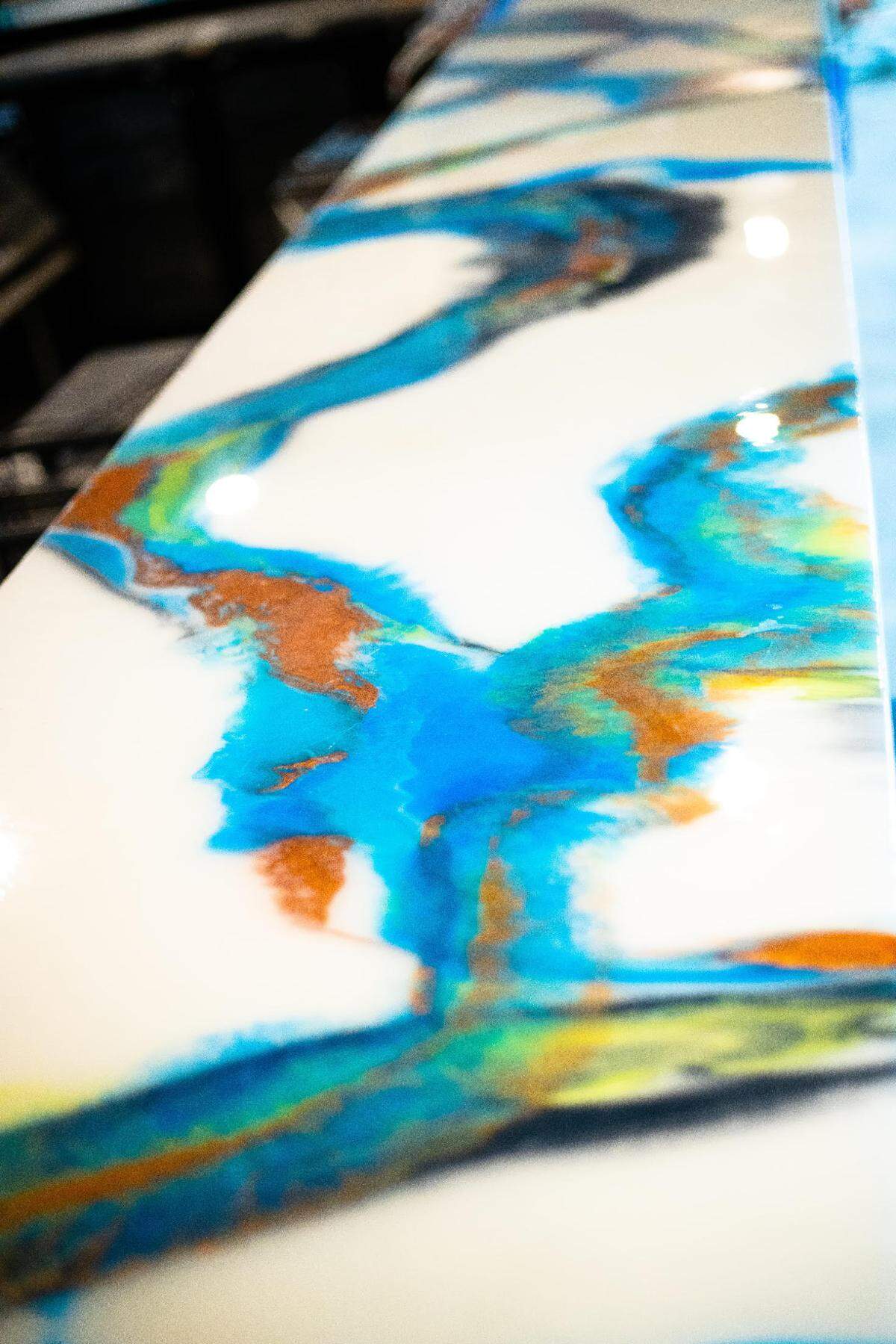 Artists are doing abstract works on Society’s tabletops.