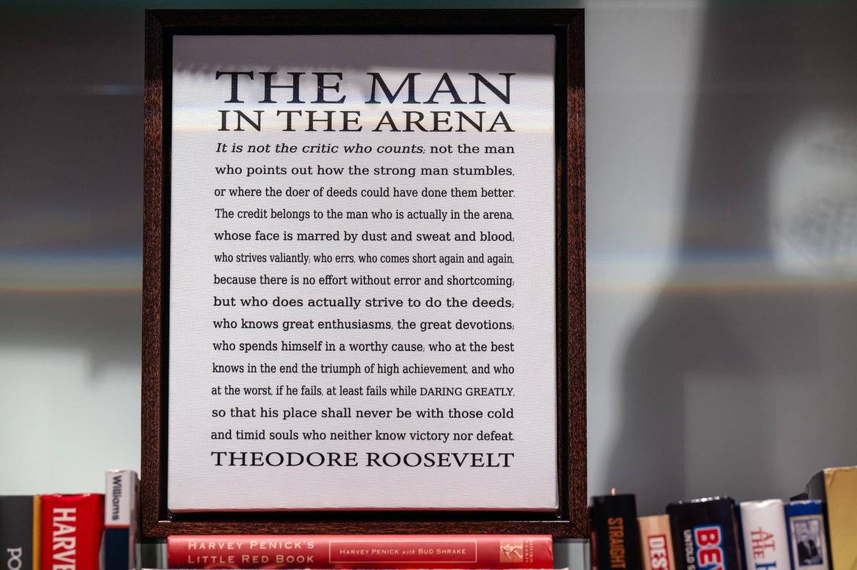 Bill Self displays a quote by President Teddy Roosevelt about “The Man in the Arena.” The plaque was a gift when Self took his first head coaching job in 1993-1994 at Oral Roberts.