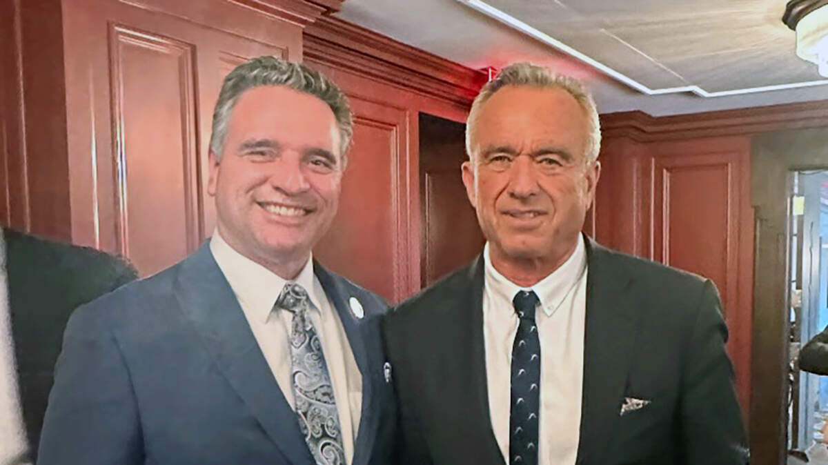 Ty Masterson, left, with U.S. Health and Human Services Secretary Robert F. Kennedy Jr. Masterson, a leading GOP candidate for Kansas governor, has been enlisting key Trump figures for his own election push.