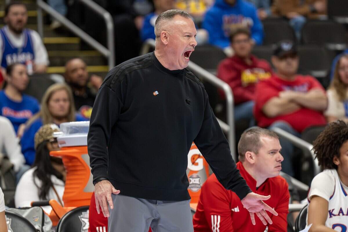 Kansas Jayhawks coach Brandon Schneider yells during the second quarter against the UCF Knights in the Big 12 Women's Basketball Tournament at T-Mobile Center on Wednesday, March 4, 2026, in Kansas City.