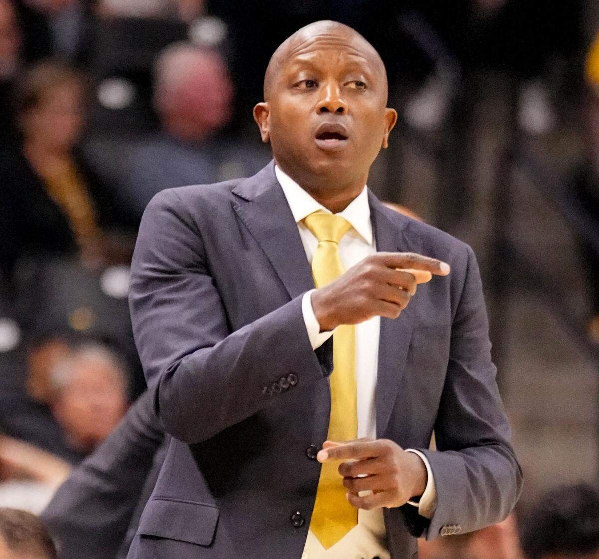 Missouri Tigers men’s basketball coach Dennis Gates conveys guidance to his players during MU’s home opener against the Howard Bison at Mizzou Arena in Columbia, Mo. on Friday, Nov. 8, 2024.