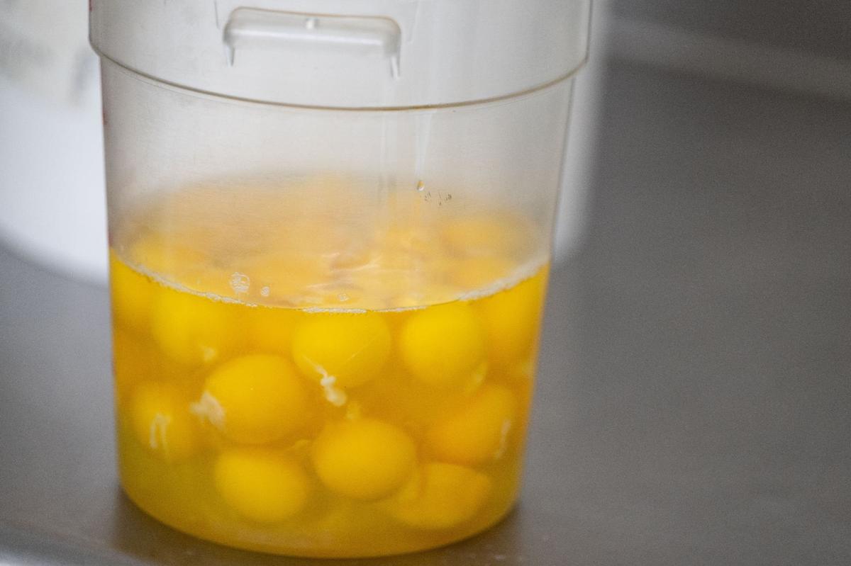 A bucket of eggs waits to be added to a batter at Scratch KC.