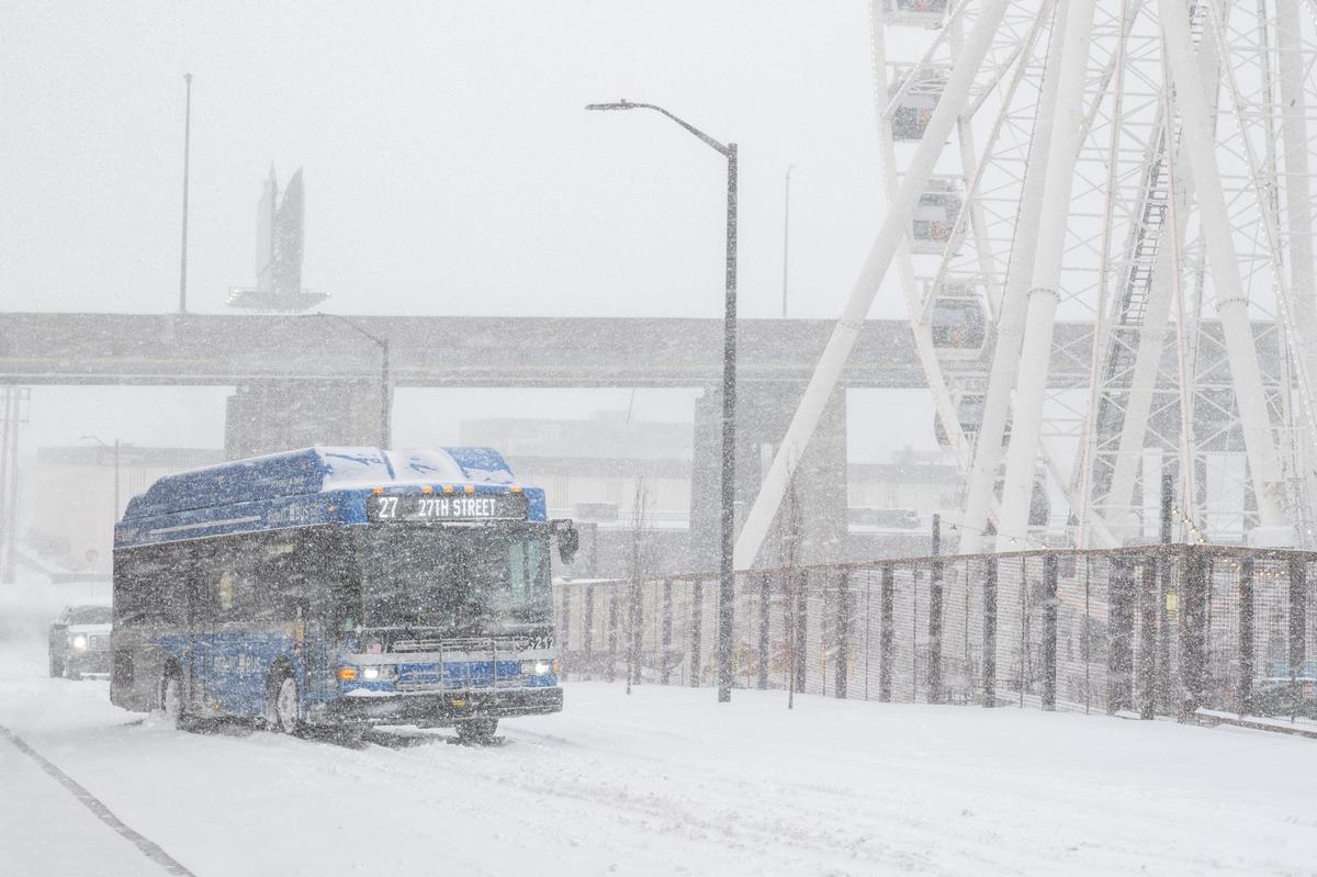 A RideKC bus was stuck in the snow near the KC Wheel during whiteout conditions on Sunday, Jan. 5, 2025. Buses continued to operate during the snowstorm.