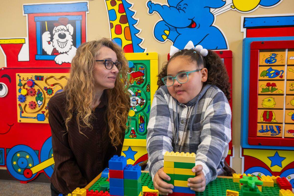 Cori Harris and her daughter, Oakley, on Wednesday, March 11, 2026, in Bonner Springs. Oakley, a student in Bonner Springs-Edwardsville Unified School District, has received special education services since she was a toddler.