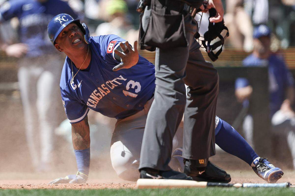 Salvador Perez #13 of the Kansas City Royals reacts after he was called out after sliding into home plate during the fourth inning against the Seattle Mariners at T-Mobile Park on May 03, 2026 in Seattle, Washington.