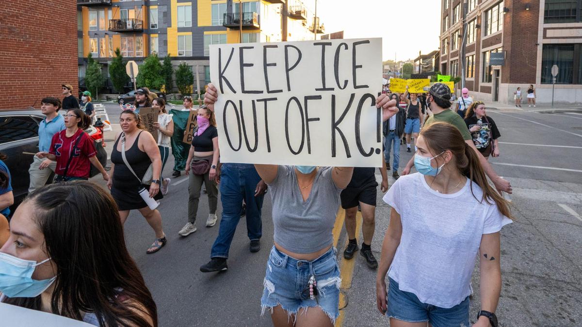 A protester wears a mask at the “Shut Down ICE” protest on Kansas City’s West Side and downtown areas on Tuesday, June 10.
