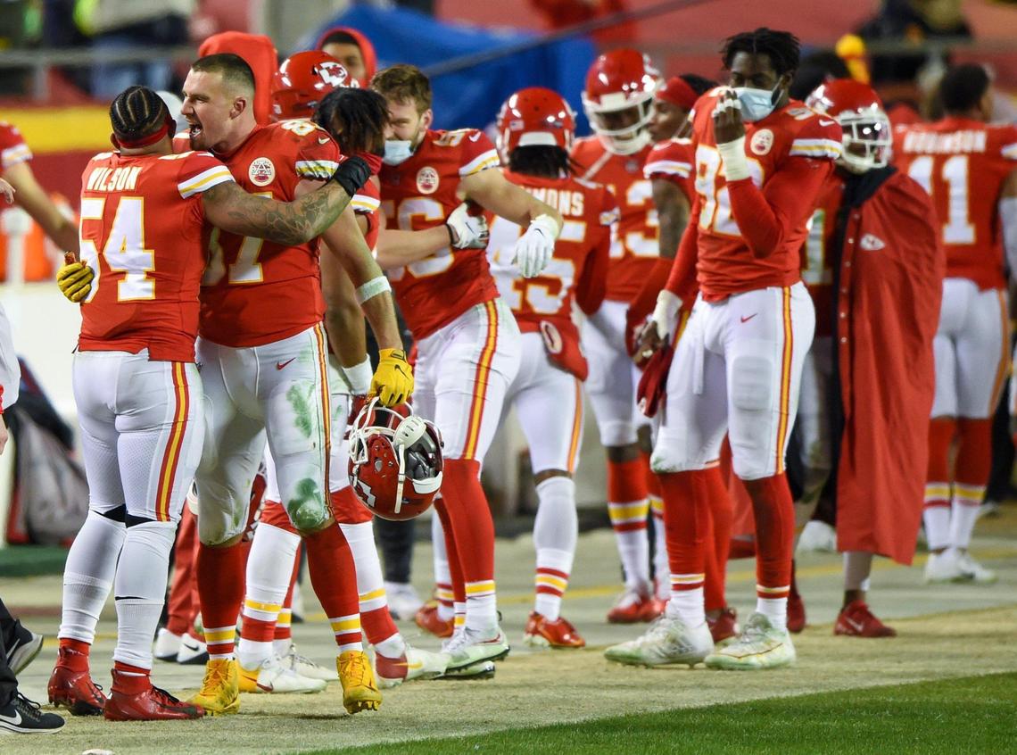 Kansas City Chiefs outside linebacker Damien Wilson celebrates with tight end Travis Kelce (87) as the Chiefs ran out the clock to win the AFC Championship Game, 38-24, over the Buffalo Bills on Sunday, Jan. 24, 2021, at Arrowhead Stadium in Kansas City.