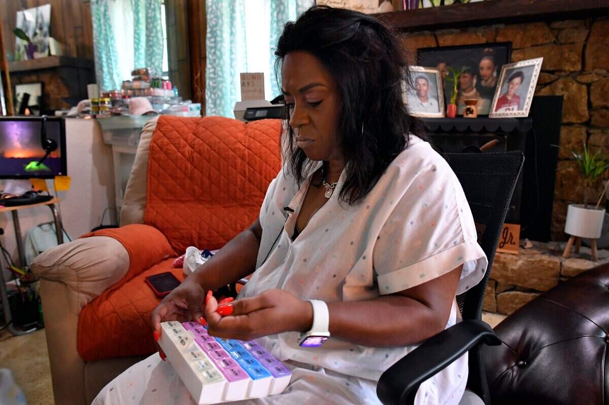 Shantell Williams took her multiple medications shortly after being diagnosed with long COVID in 2021.